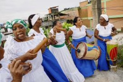 Afro-Colombian women in traditional cumbia dress with drums - celebrating African diaspora culture and traditions on the Wonders of Colombia river cruise 2027